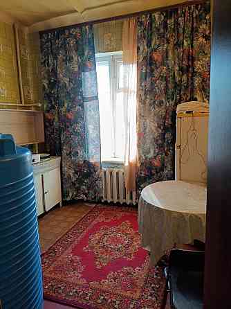 Продам 1 комнату в 2х-комнатной квартире. Объединенный рынок. Донецк