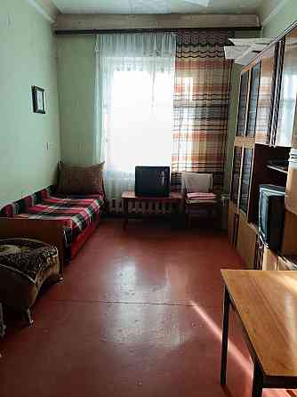 Продам 1 комнату в 2х-комнатной квартире. Объединенный рынок. Донецк