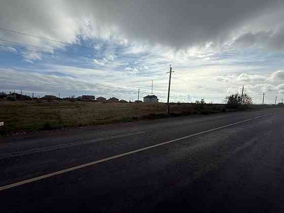 Продается земельный участок вдоль дороги в Мелекино Мариуполь