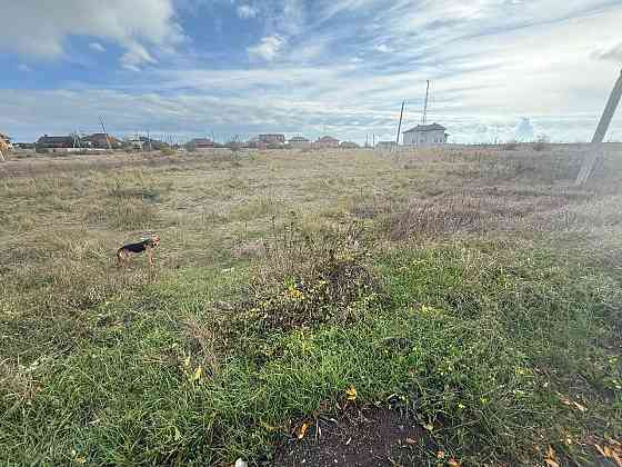 Продается земельный участок вдоль дороги в Мелекино Мариуполь