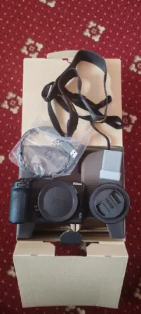 Продам новый беззеркальный фотоаппарат Nikon Z30 Kit 16-50mm f/3.5-6.3 и накамерную вспышку Godox Донецк