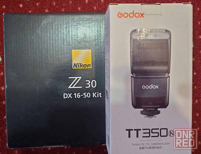 Продам новый беззеркальный фотоаппарат Nikon Z30 Kit 16-50mm f/3.5-6.3 и накамерную вспышку Godox Донецк - изображение 1