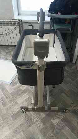 Кроватка для новорожденного приставная с электрокачелями Донецк