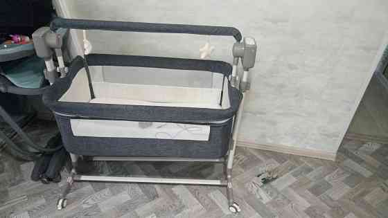 Кроватка для новорожденного приставная с электрокачелями Донецк