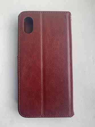 iPhone Xr, 64 гб с кожаным чехлом-книжкой на магнитах . Донецк