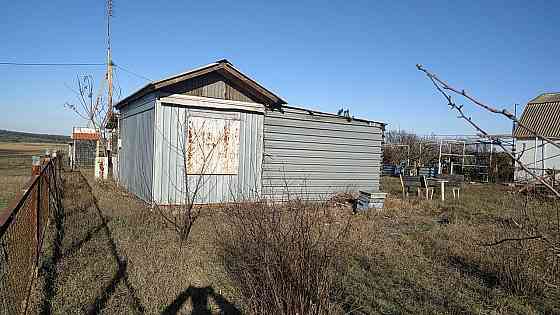 Участок с домом и гаражем в Юрьевке Донецк