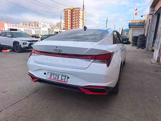Хундай Элантра год выпуска 2022 белый жемчуг цвет кузова бензин Донецк