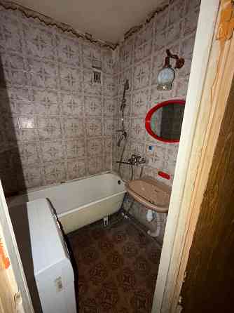 Продам четырехкомнатную квартиру в центре города Ясиноватая