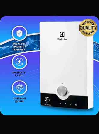 Продам проточный водонагреватель Донецк