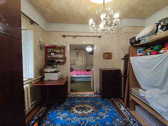 Продам жилой дом в Ленинском р-не Донецка. 9.2 сотки приватизированной земли. Донецк