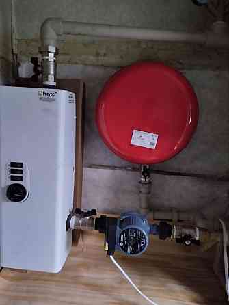 Электрокотёл отопления установка Торез