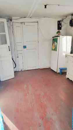 Продам дом в Донецкой Народной Республике, городской округ Мариуполь, пгт. Сартана, ул. Полевая. Мариуполь