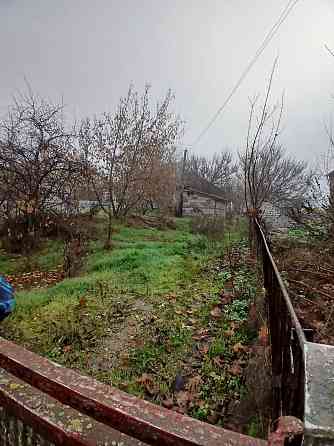 Продажа дома с большим приватизированным земельным участком Мариуполь