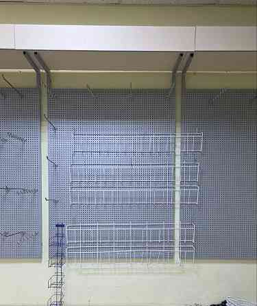 Металлические перфорированные стеллажи для магазина/бутика Донецк