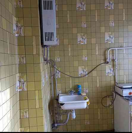 Продам 1 комнату в 2х-комнатной квартире. Рынок Объединенный. Донецк