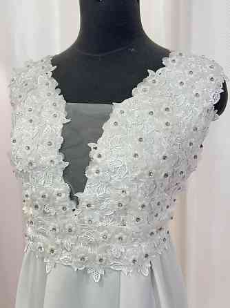 Продам свадебное платье новое Макеевка