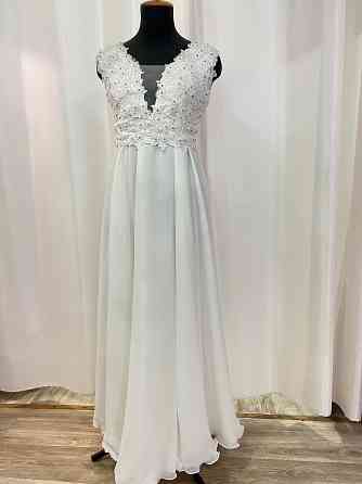 Продам свадебное платье новое Макеевка