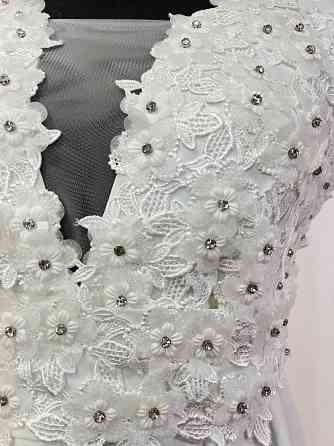 Продам свадебное платье новое Макеевка