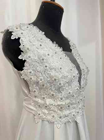 Продам свадебное платье новое Макеевка