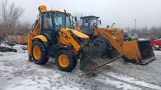 Услуги экскаватора-погрузчика Макеевка