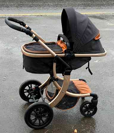 Продам коляску, ходунки в подарок Донецк