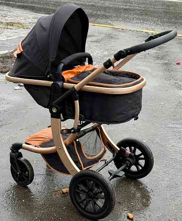 Продам коляску, ходунки в подарок Донецк