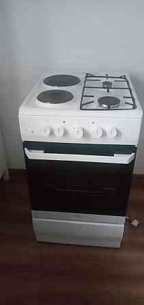 Продам комбинированную электроплиту Hansa (2 конфорки газовые) Донецк