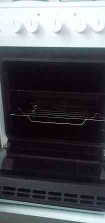 Продам комбинированную электроплиту Hansa (2 конфорки газовые) Донецк