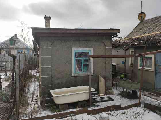 Продам дом на Текстильщике(11 посёлок) под ремонт. 4 комнаты(2 из них маленькие). 4 сотки Донецк