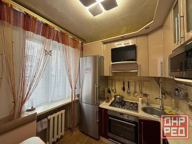 3 ком. квартира, 57 кв.м., 2/4 этаж, б. Шевченко, Калининский рынок, Калининский р-н кирпичный дом Донецк - изображение 9