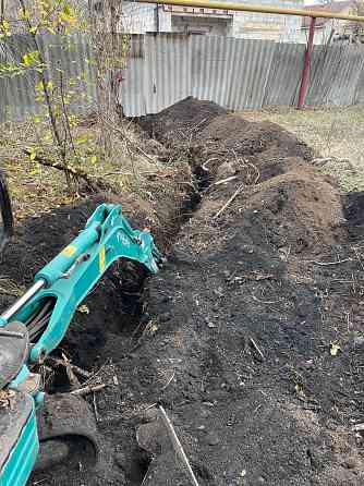 Копка ям,траншей и тд Донецк