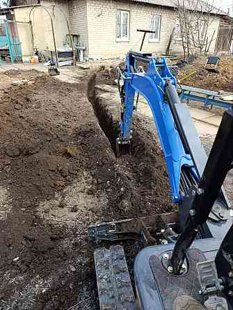 Копка ям,траншей и тд Донецк