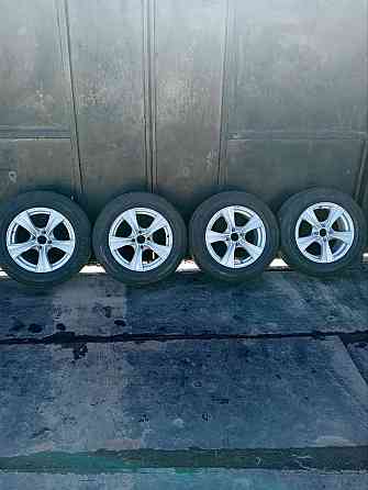 Продам диски с резиной 205/60 R15 в хорошем состоянии. Цена 30 000 руб. Донецк