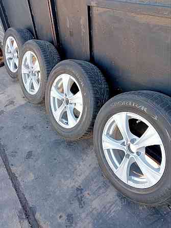 Продам диски с резиной 205/60 R15 в хорошем состоянии. Цена 30 000 руб. Донецк