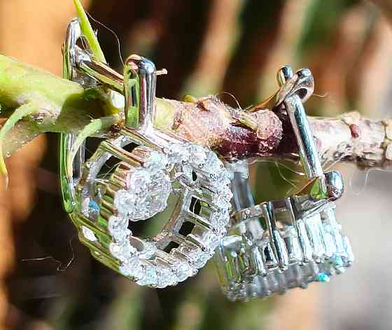 Серебряные серьги с танцующим фианитом Донецк