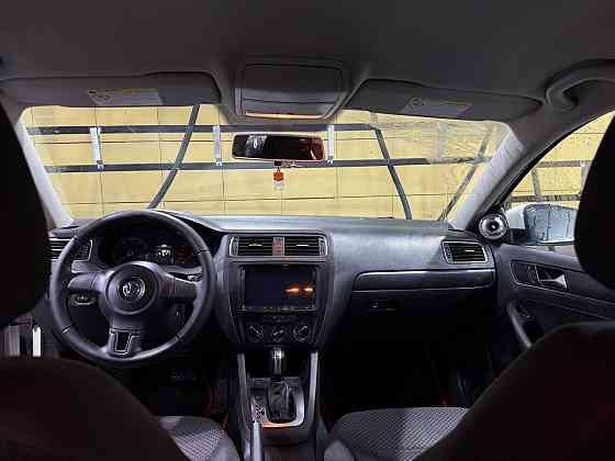 Volkswagen Jetta Официальная 2.0 литра атмосферник автомат Айсин 2014 год Донецк