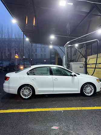 Volkswagen Jetta Официальная 2.0 литра атмосферник автомат Айсин 2014 год Донецк