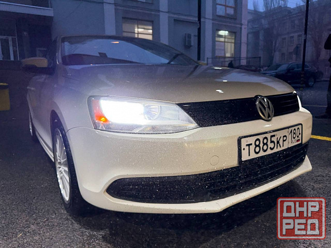 Volkswagen Jetta Официальная 2.0 литра атмосферник автомат Айсин 2014 год Донецк - изображение 1