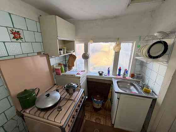 Продам дом с газом, 82 м.кв., участок 16 соток - г. Харцызск, ул. Колхозная Харцызск