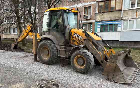 Услуги экскаватора-погрузчика Донецк