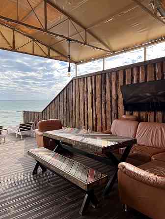 Коттедж на берегу моря. Все удобства. Посуточная аренда. Центральный пляж Урзуф