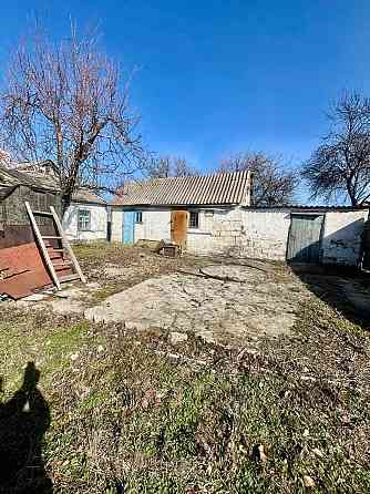 Продается небольшой дом с приватизированным земельным участком. Мариуполь