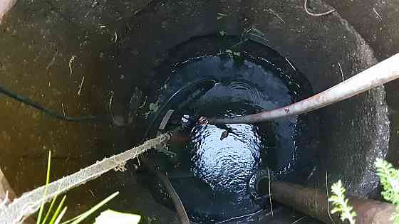 Откачка воды с колодцев , подвалов . Донецк