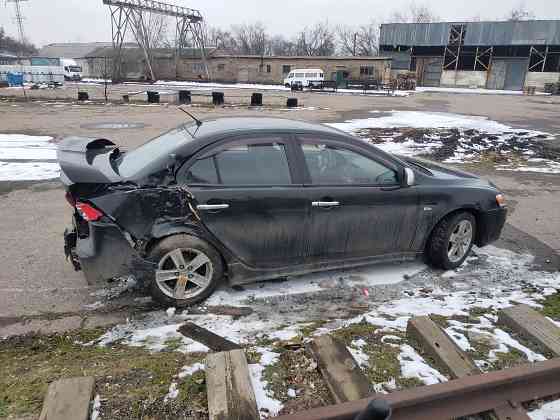 Митсубиси Лансер 10 2.0 акпп Донецк