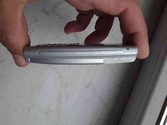 Sony Ericsson T100+зарядное+новый аккумулятор Донецк