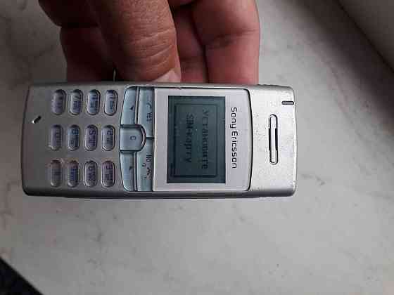 Sony Ericsson T100+зарядное+новый аккумулятор Донецк