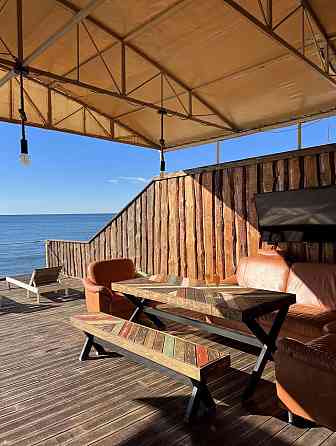 Сдам коттедж на берегу моря посуточно. Первая линия пляжа. Центральный пляж Урзуф