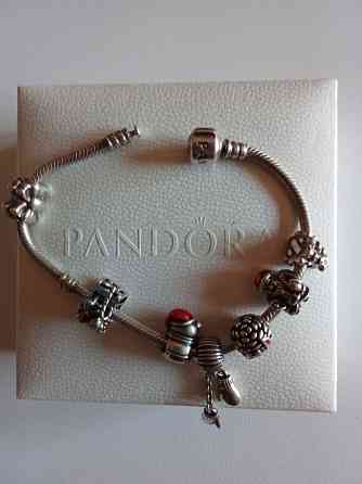 Продам серебряный оригинальный браслет Pandora с шармами. Донецк