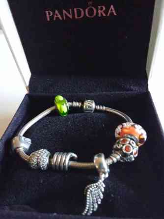 Продам серебряный оригинальный браслет Пандора с шармами. Донецк