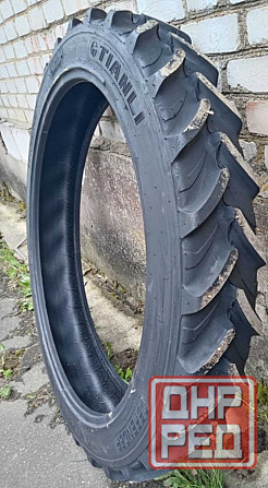 Продам новые шины размер 11.2/32 Донецк - изображение 1
